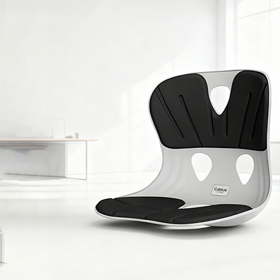 柯柏蓝健康坐姿护腰坐垫产品展示，深蓝色人体工学设计坐垫，正面展示，白色背景，明亮自然光